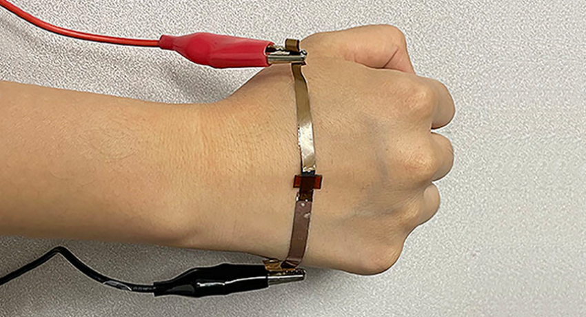 Flexible graphene wrapped around human hand