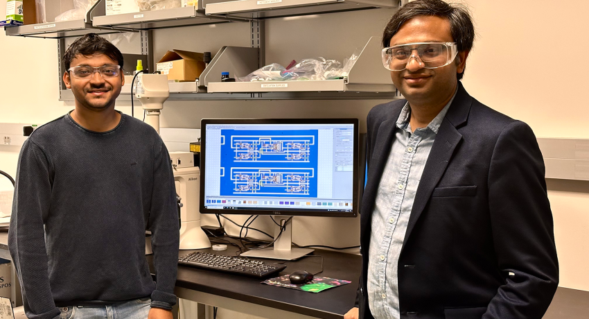 Student and Professor in Lab