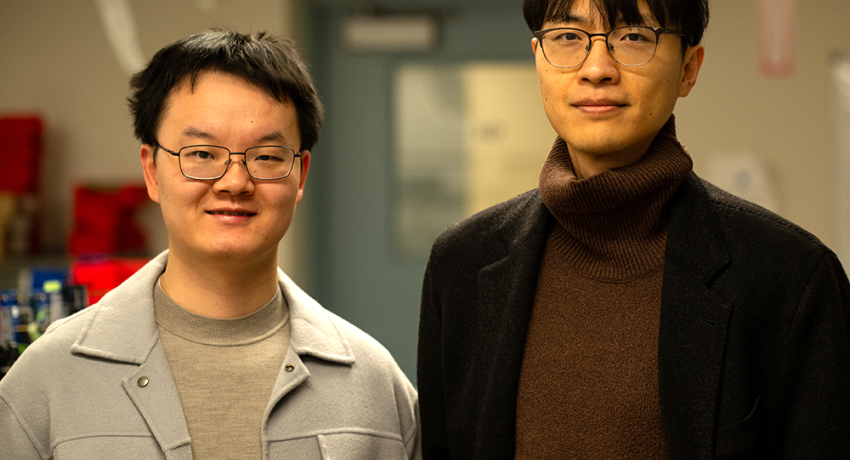 Student and professor in lab
