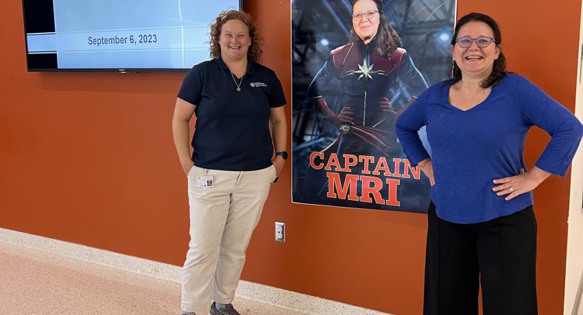 Sarah Eichfeld and Zoubeida Ounaies with Captain MRI poster